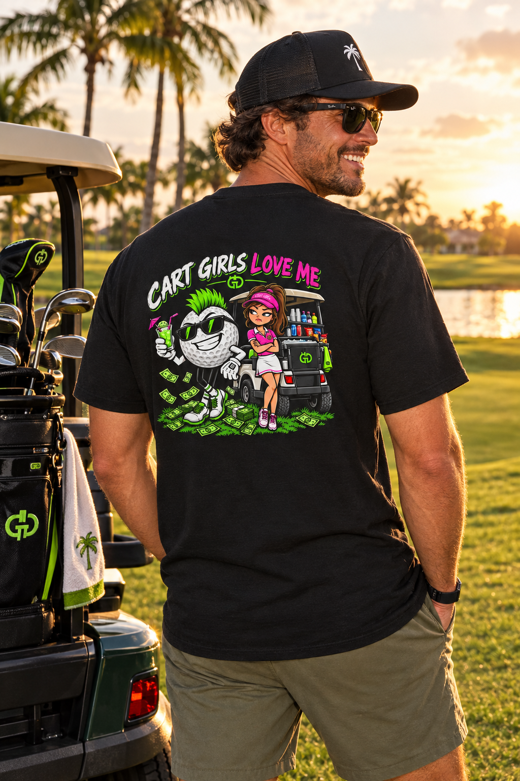 Man on a golf course wearing the Cart Girls Love Me tee