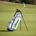 Single right-side Golf Demons White/Green golf bag on a course